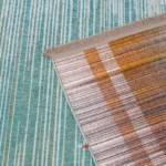 نمای تا شده قالیچه ماشینی دورو کد 1.00114 زمینه آبی مسی